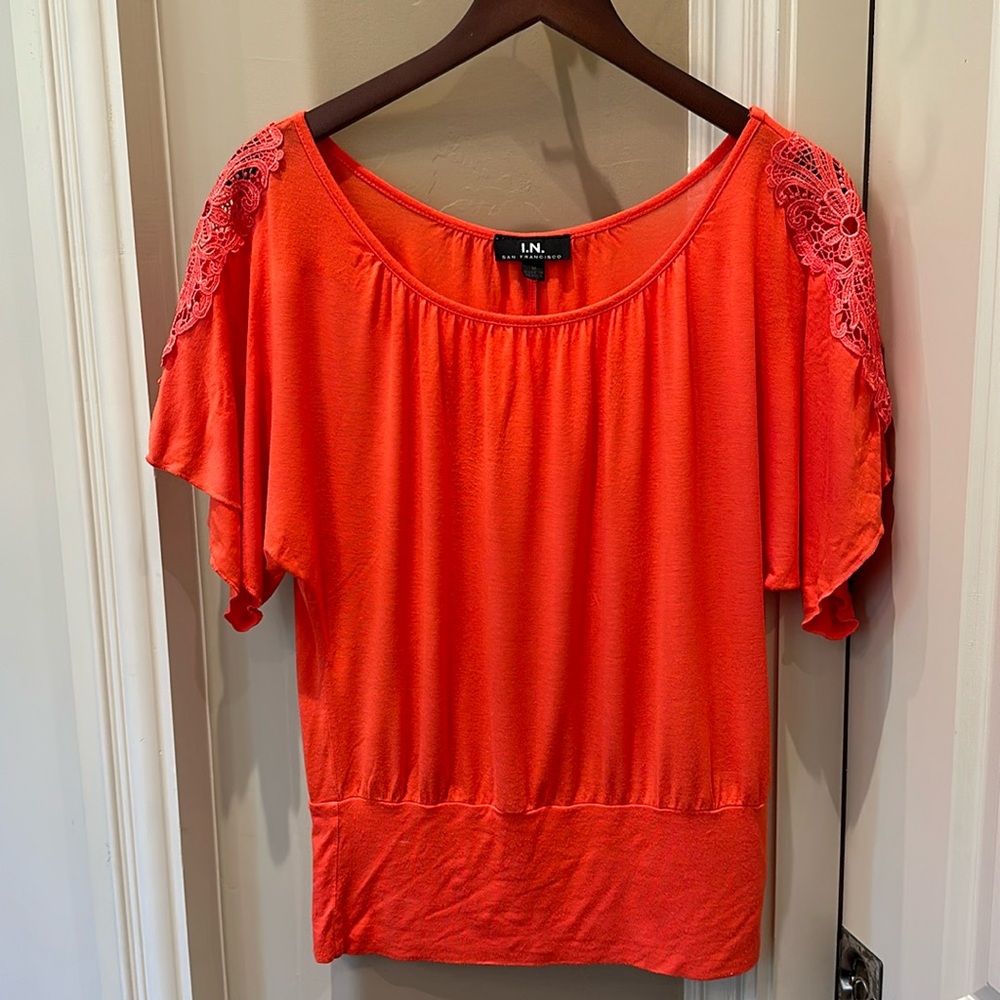 Beautiful orange jersey tee with crochet detail size medium